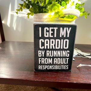 Funny sign | I get my cardio by running from adult responsibility